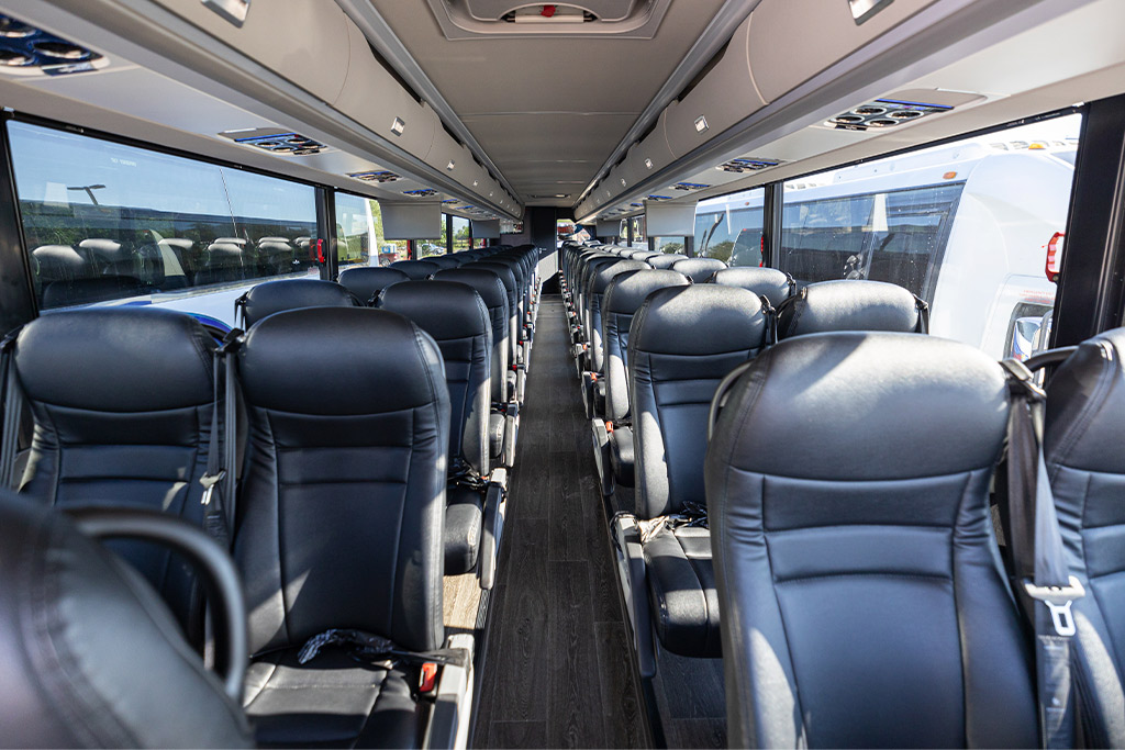 bus charter interior. Aisle and seats. Perfect for school trips and group tours.